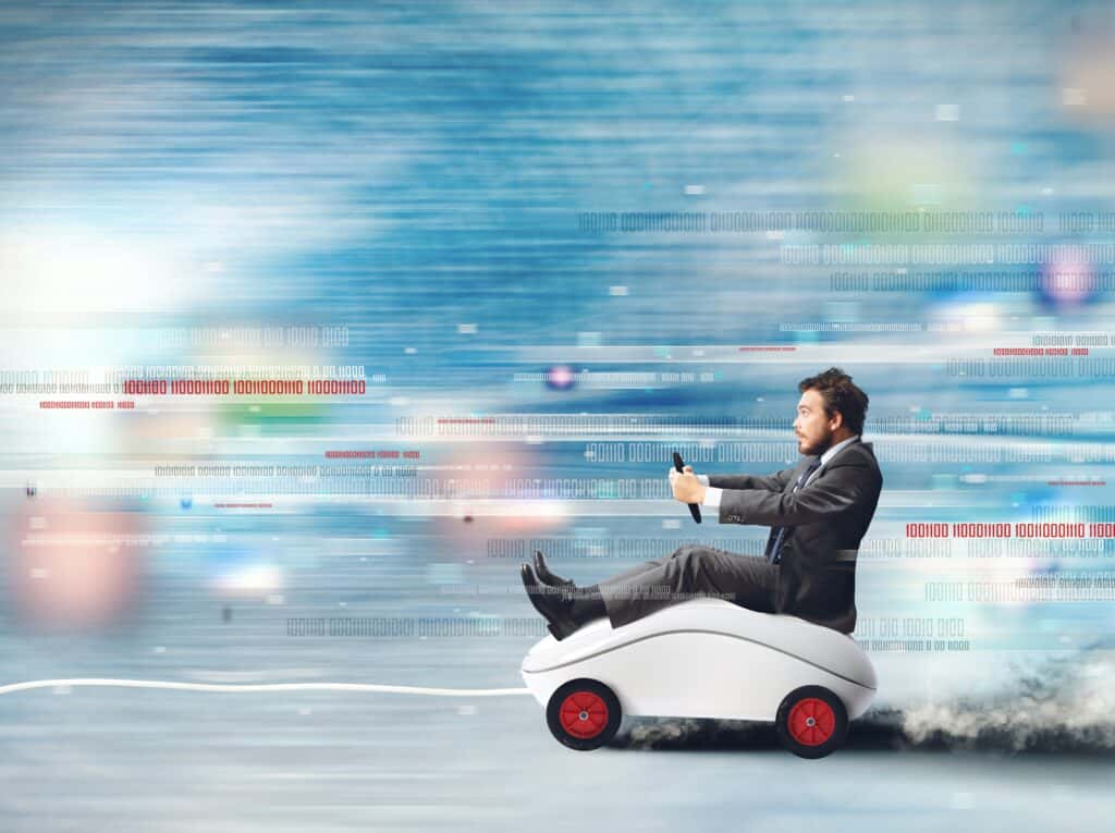 Man speeding through code sitting on a computer mouse