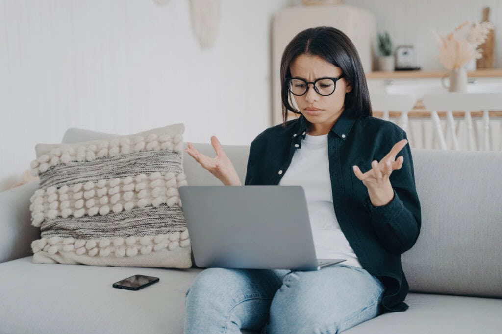 woman angry with a slow computer